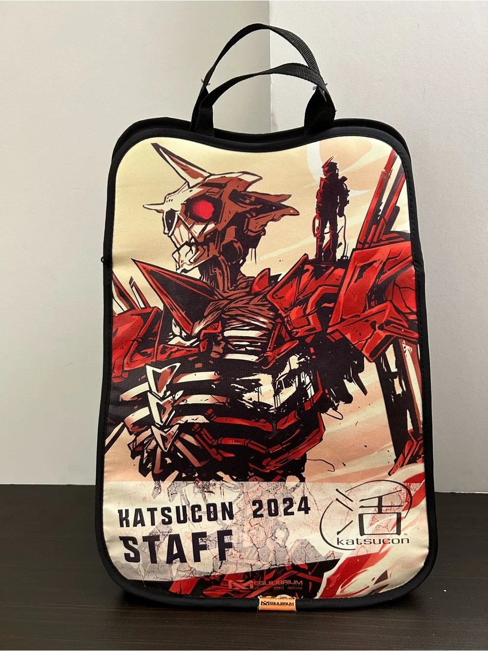Equilibrium Katsucon 2024 Mecha Anime Staff Bag designed by Sarah Miller